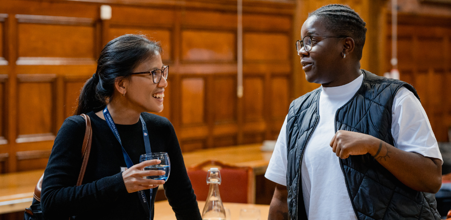 Postgraduate students chatting 