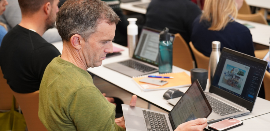 Student looking at his laptop